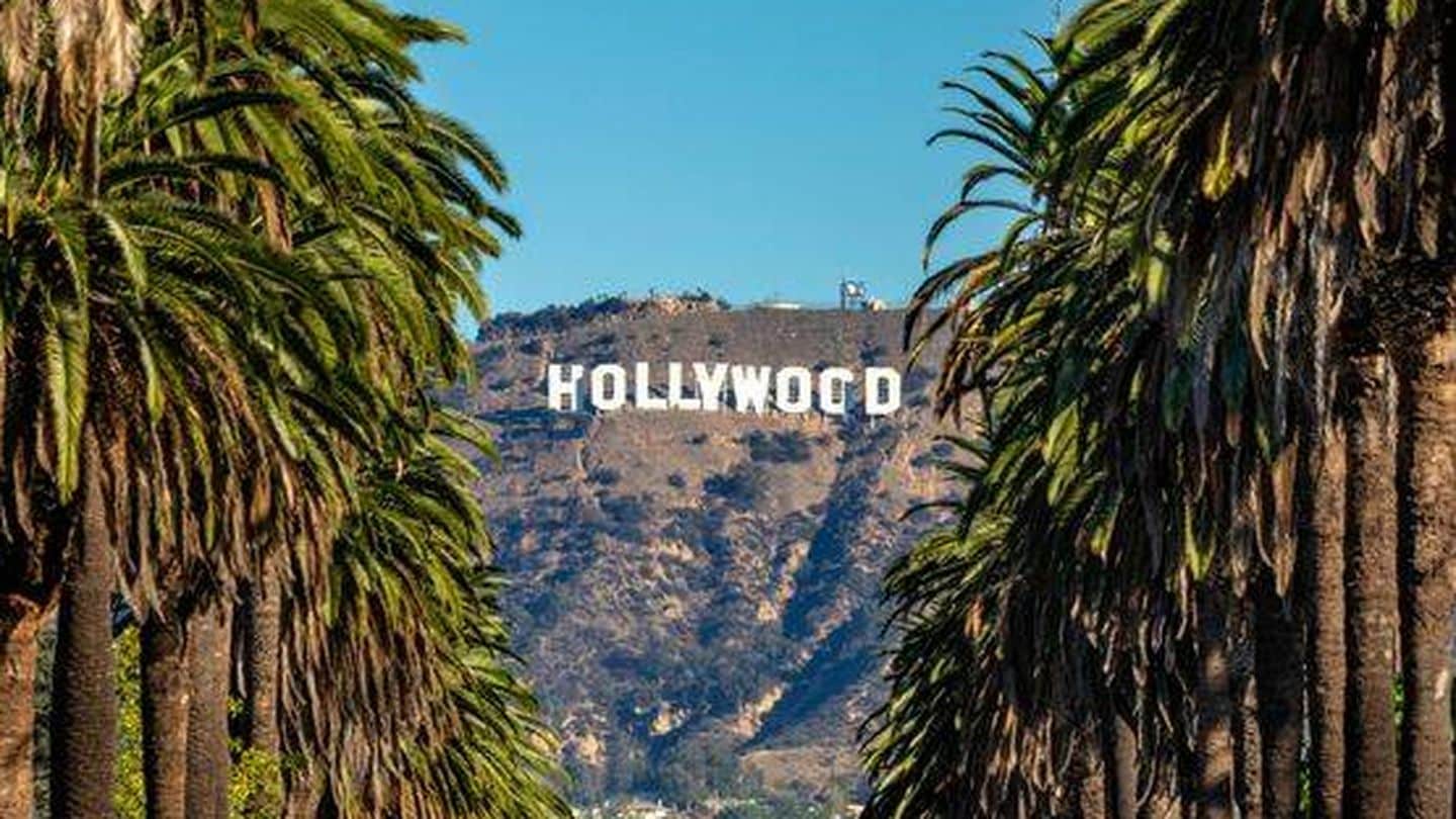 Cartel de holllywood con palmeras